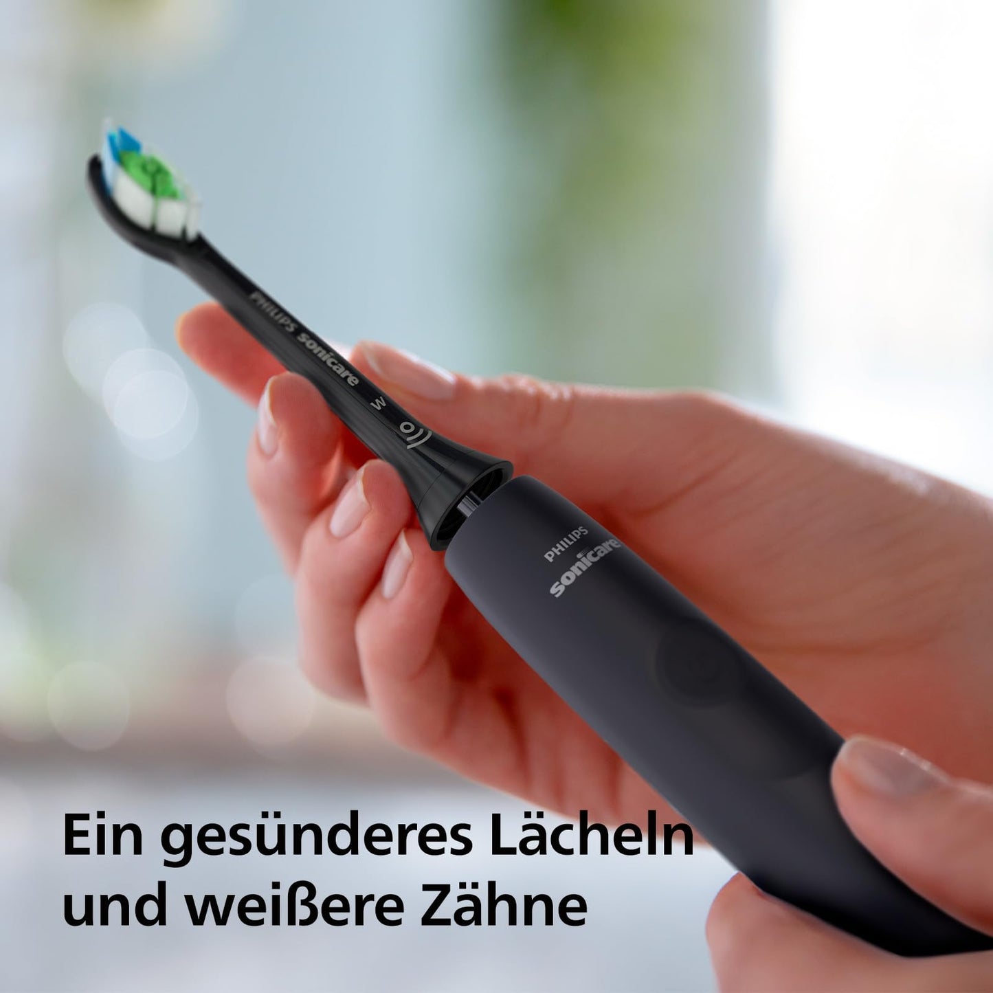 Philips Sonicare 4100 – elektrische Sonicare Zahnbürste für Erwachsene mit 1 x Philips W2 Optimal White Bürstenkopf in Schwarz, schlankem Reiseetui und USB-Ladegerät (Modell HX3683/54)