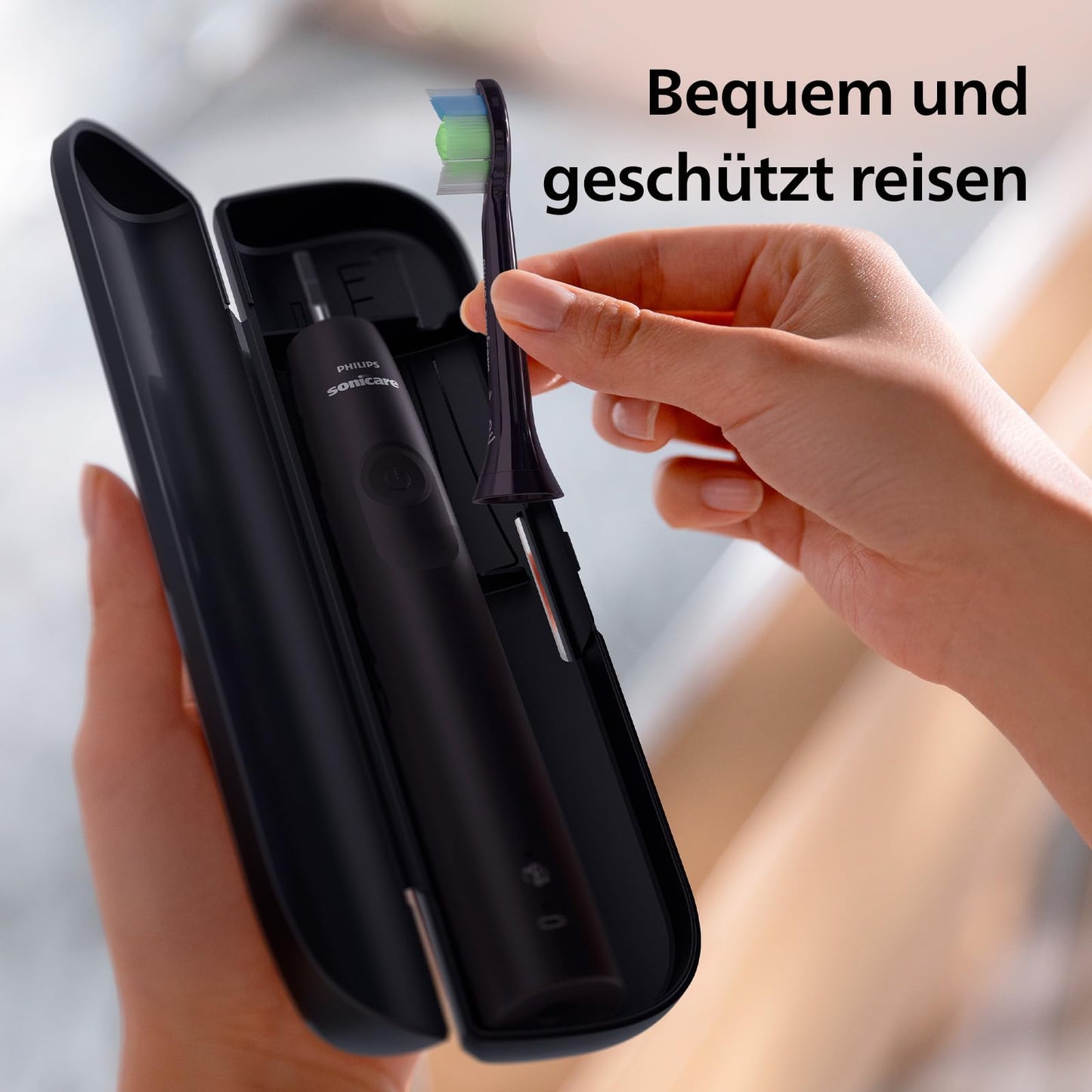 Philips Sonicare 4100 – elektrische Sonicare Zahnbürste für Erwachsene mit 1 x Philips W2 Optimal White Bürstenkopf in Schwarz, schlankem Reiseetui und USB-Ladegerät (Modell HX3683/54)